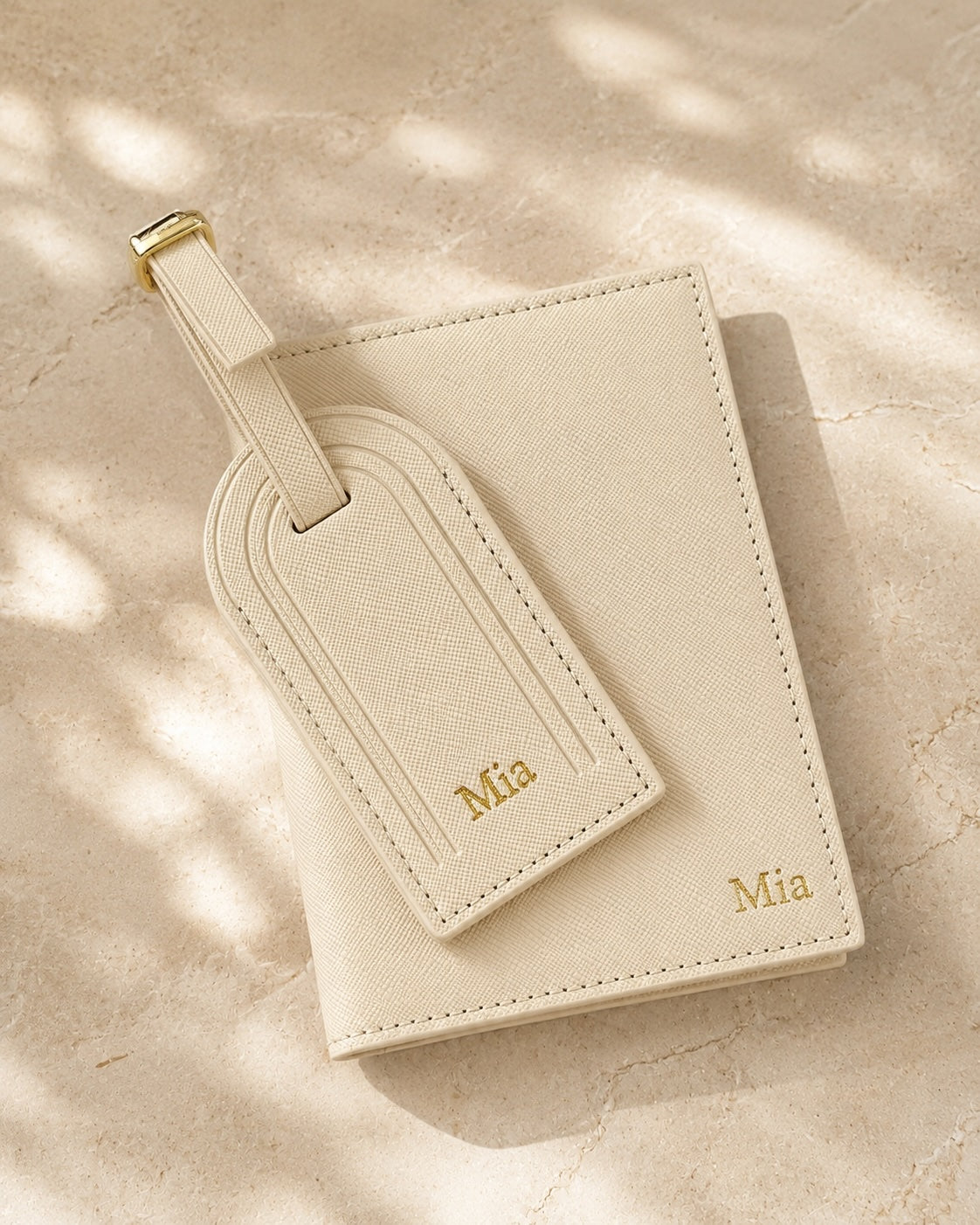 Ivory personalised passport cover and luggage tag with Mia embossed in gold foil