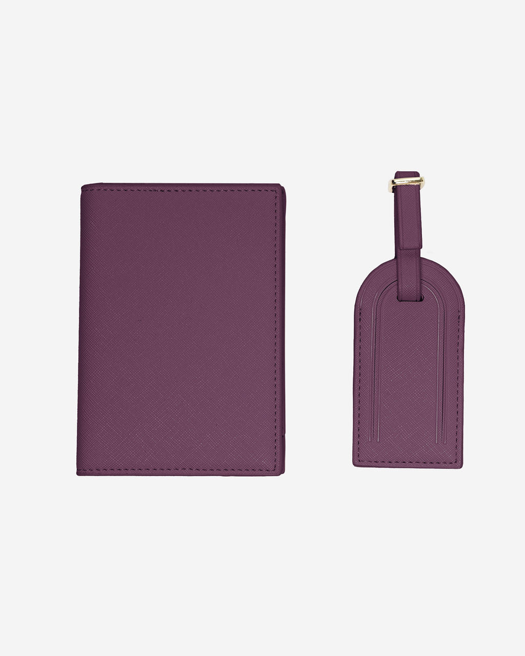 Matching burgundy Saffiano leather passport holder and luggage tag set with a gold buckle on a white background.