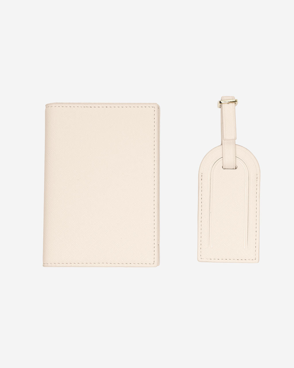Set of matching cream Saffiano leather travel accessories: a passport holder and a luggage tag with a gold-toned buckle.