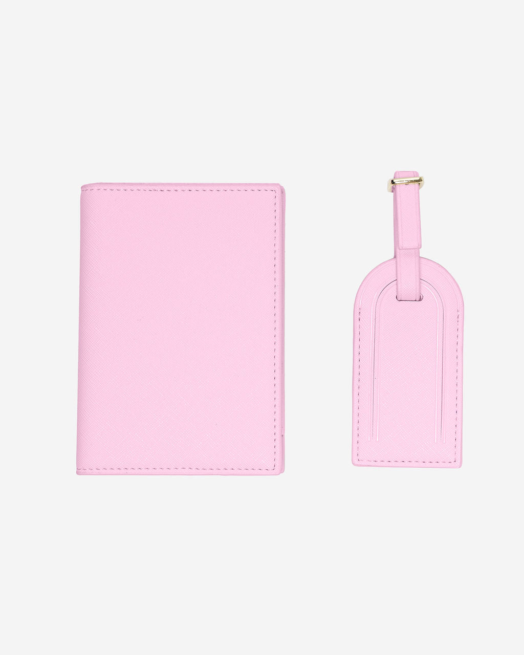 Matching light pink Saffiano leather passport holder and luggage tag set with a gold buckle on a white background.