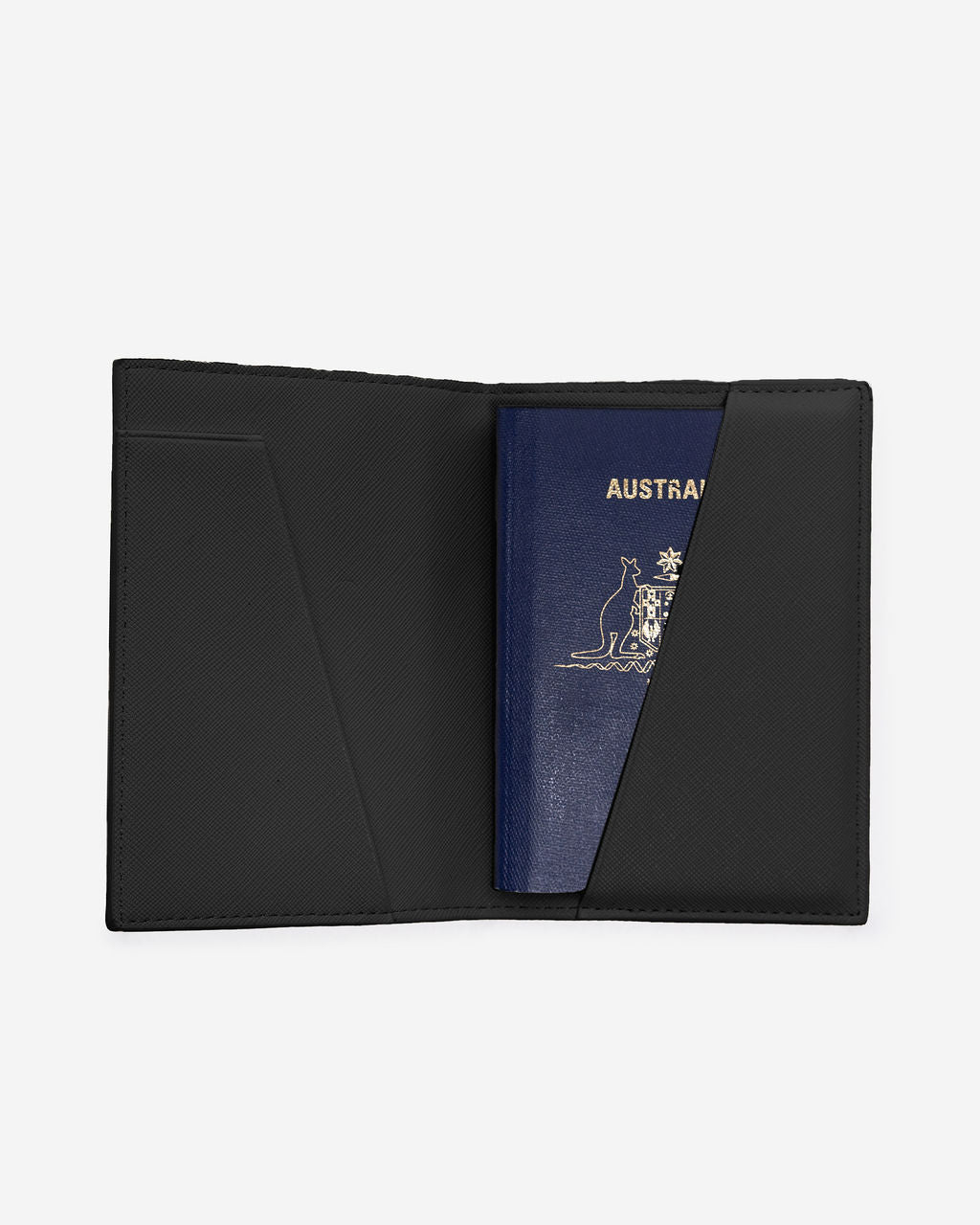 Open, black Saffiano leather passport holder displaying an Australian passport partially inserted into the right-hand pocket.