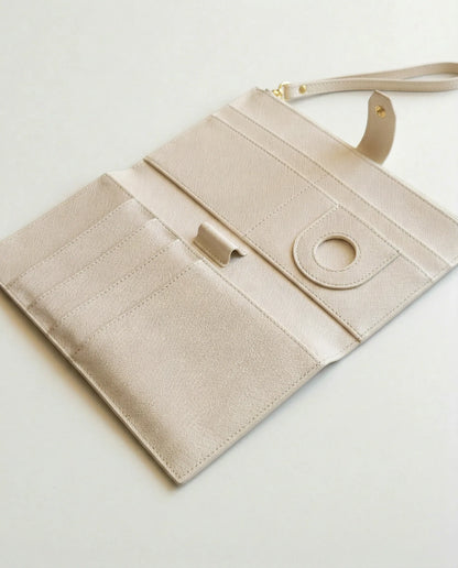 Open view of a beige Personalised Family travel wallet, featuring compartments for cards and documents.