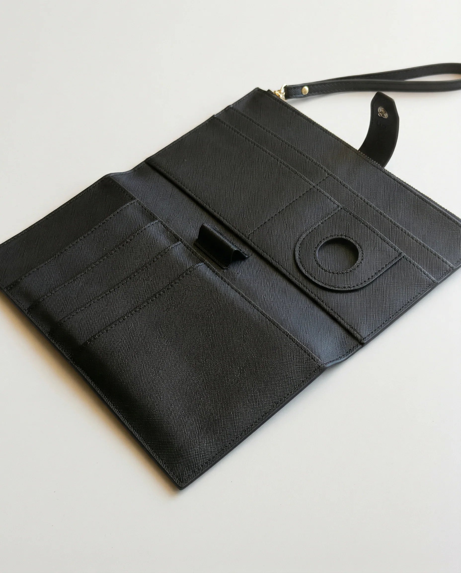 Personalised Family travel wallet open layout with multiple compartments for organization.